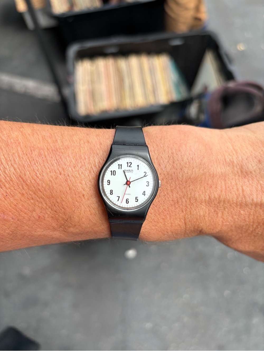 Swatch Black Watch with White Dial and Red Seconds Hand